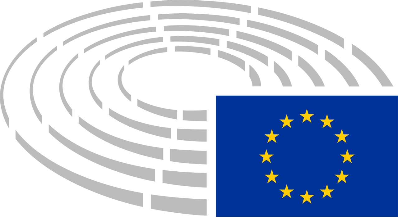 Ilustracja przedstawia logo parlamentu europejskiego. Pięć okręgów obok siebie od najmniejszego do największego symbolizujące ławy europosłów. W prawym dolnym rogu flaga Unii Europejskiej.