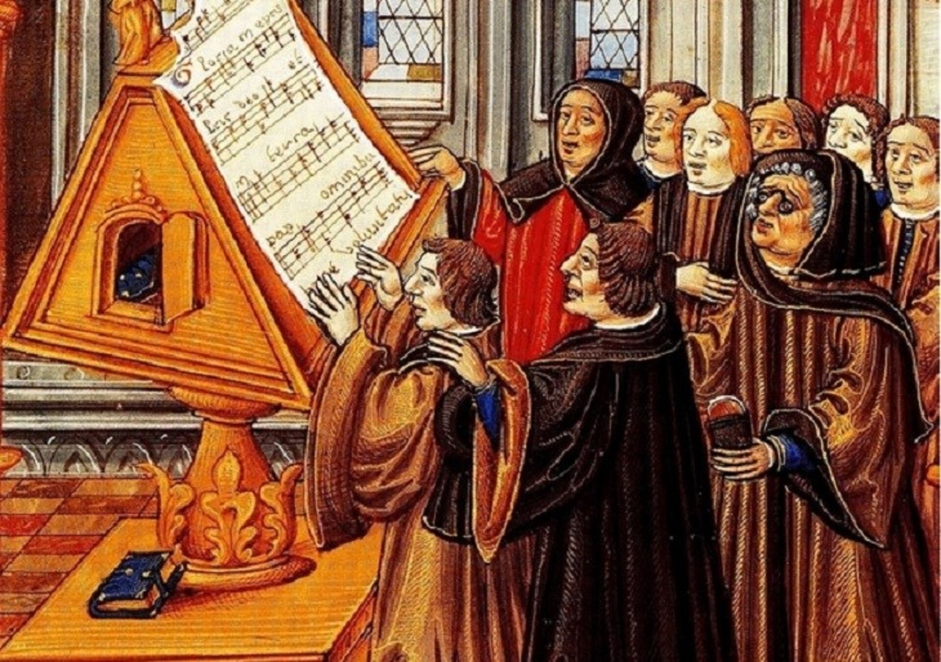 Ilustracja przedstawia obraz ukazujący Johannes'a Ockeghema dyrygującego chórem. Mężczyźni ubrani w brązowe, długie szaty. Unoszą ręce ku górze śpiewając Glorię.