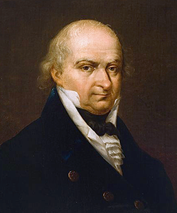 Portret starszego mężczyzny. Strój historyczny: wysoki kołnierz koszuli, surdut.