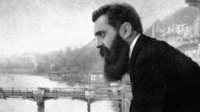 Teodor Herzl, ojciec duchowy państwa żydowskiego Źródło: E. M. Lilien, Teodor Herzl, ojciec duchowy państwa żydowskiego, domena publiczna.