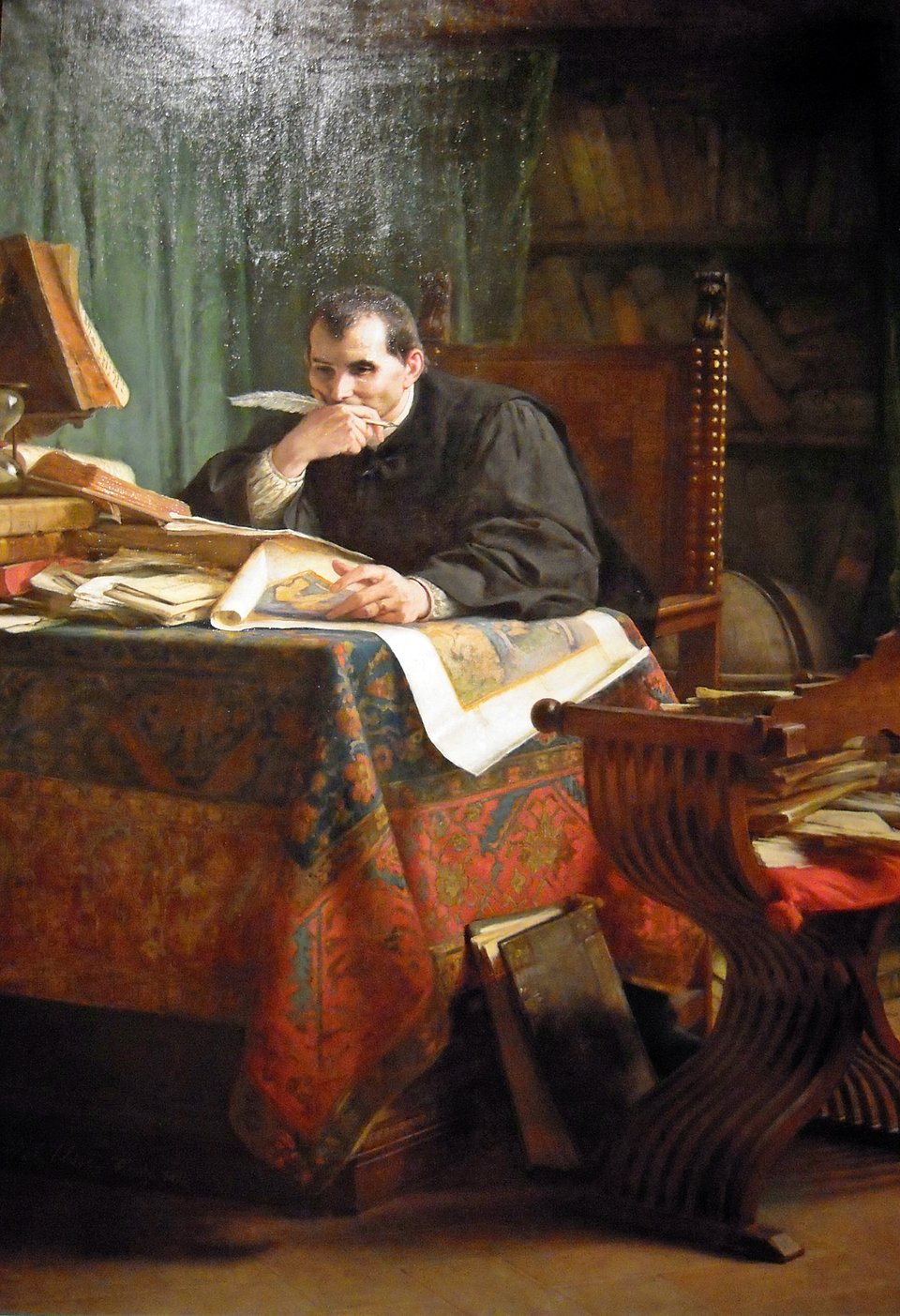 Niccolo Machiavelli przy pracy wg włoskiego obrazu z XIX w. Źródło: Stefano Ussi, Niccolo Machiavelli przy pracy wg włoskiego obrazu z XIX w., 1894, Galeria Sztuki Nowoczesnej i Współczesnej w Rzymie, domena publiczna.