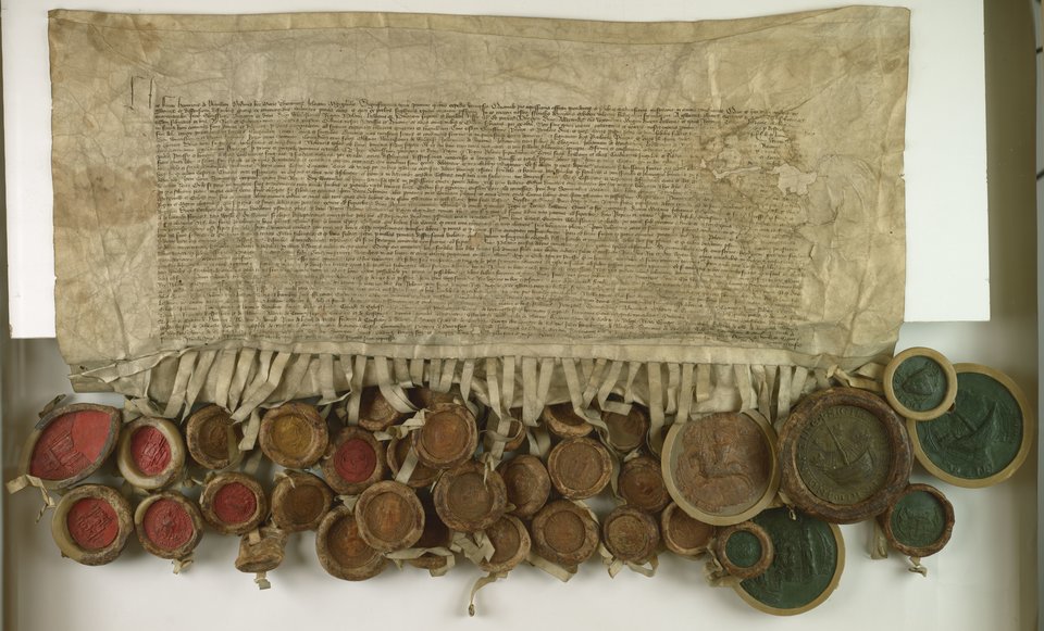 Henryk von Plauen, wielki mistrz zakonu krzyżackiego, zawiera pokój z Władysławem Jagiełło, królem polskim, Witoldem, wielkim księciem litewskim Źródło: Henryk von Plauen, wielki mistrz zakonu krzyżackiego, zawiera pokój z Władysławem Jagiełło, królem polskim, Witoldem, wielkim księciem litewskim, Pergamin, Archiwum Główne Akt Dawnych, domena publiczna.