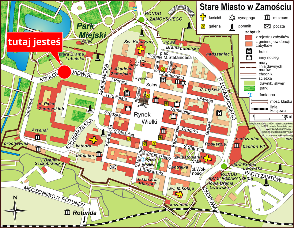Na ilustracji pokazano plan miasta, z oznaczonymi na biało ulicami, brązowymi budynkami. Za pomocą punktowych znaków kartograficznych zaznaczono: kościoły, synagogi, galerie, muzea, pomniki. Kolorem zielonym oznaczono: parki, trawniki i skwery. Na planie za pomocą dużej czerwonej kropki zaznaczono miejsce, w którym znajduje się obserwator.